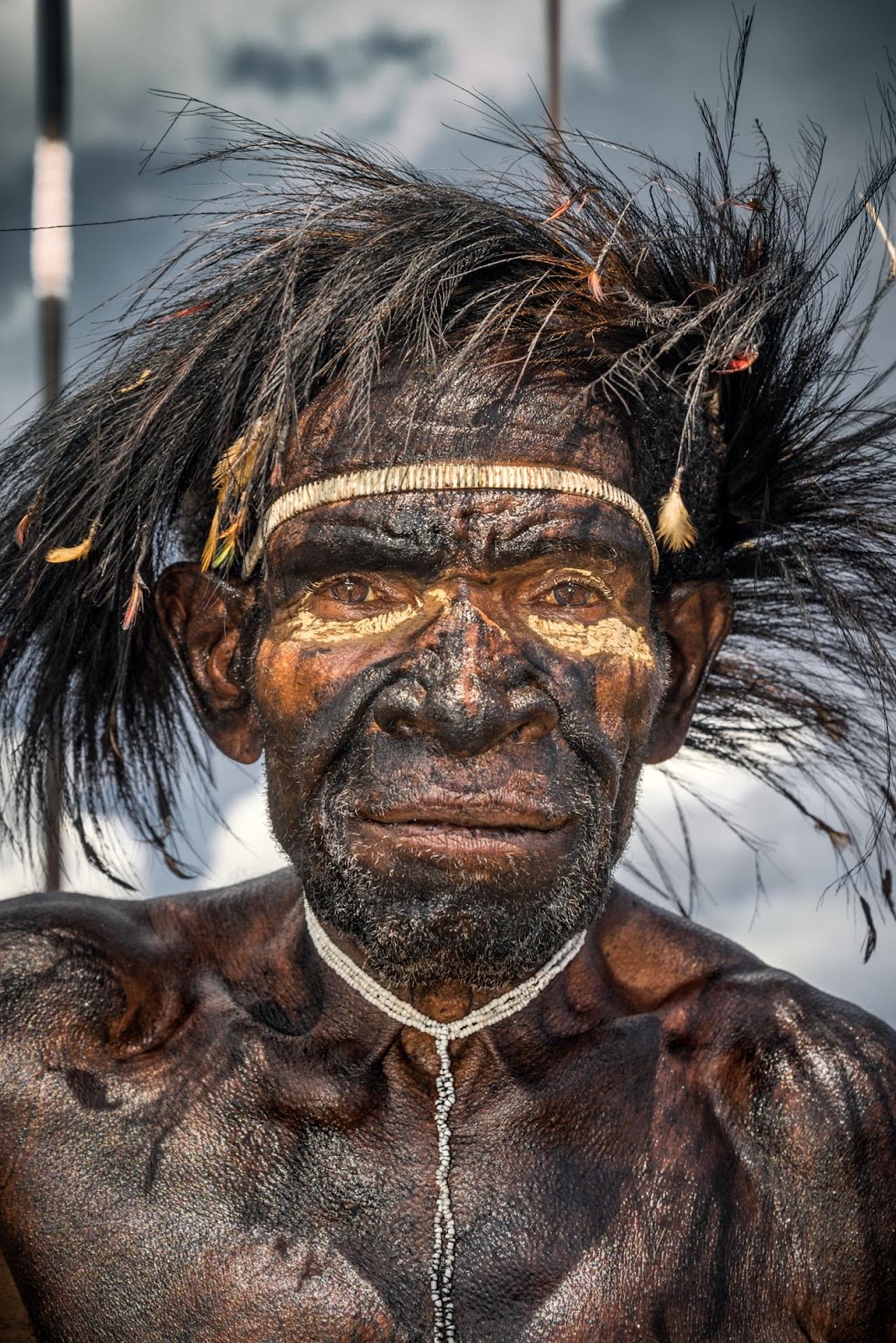 Creator/Contributor: famed Italian travel photographer, Roberto Pazzi; understated 2013 portrait brilliantly capturing the historical essence of the Dani Warrior from the Baliem Valley, West Papua (Indonesia).
